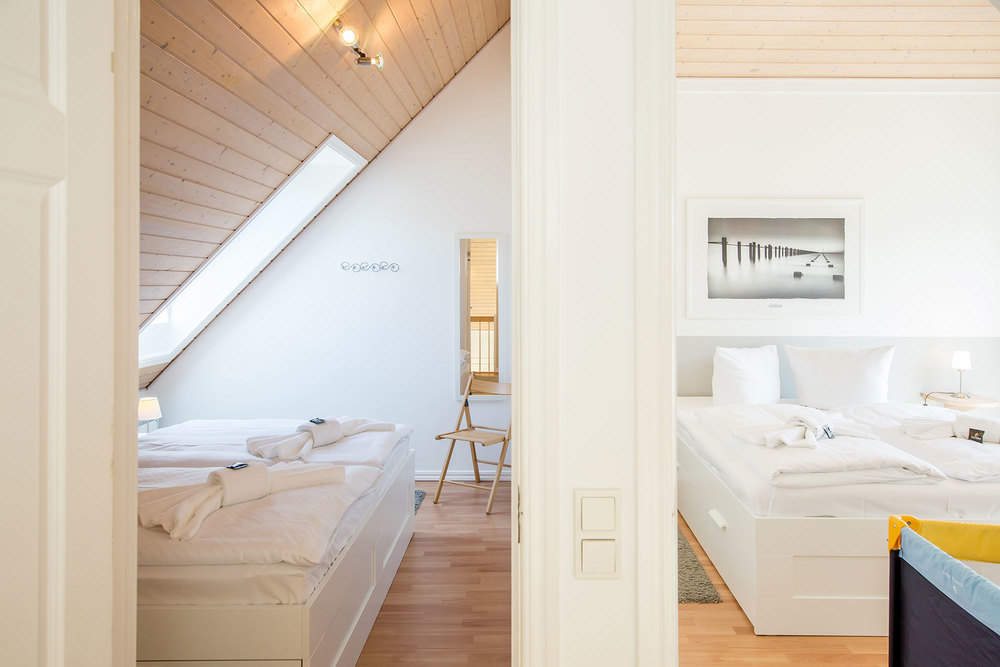 4325-Schlafzimmer-Bett-Traeumen-Stama-Ferienhaus.jpg